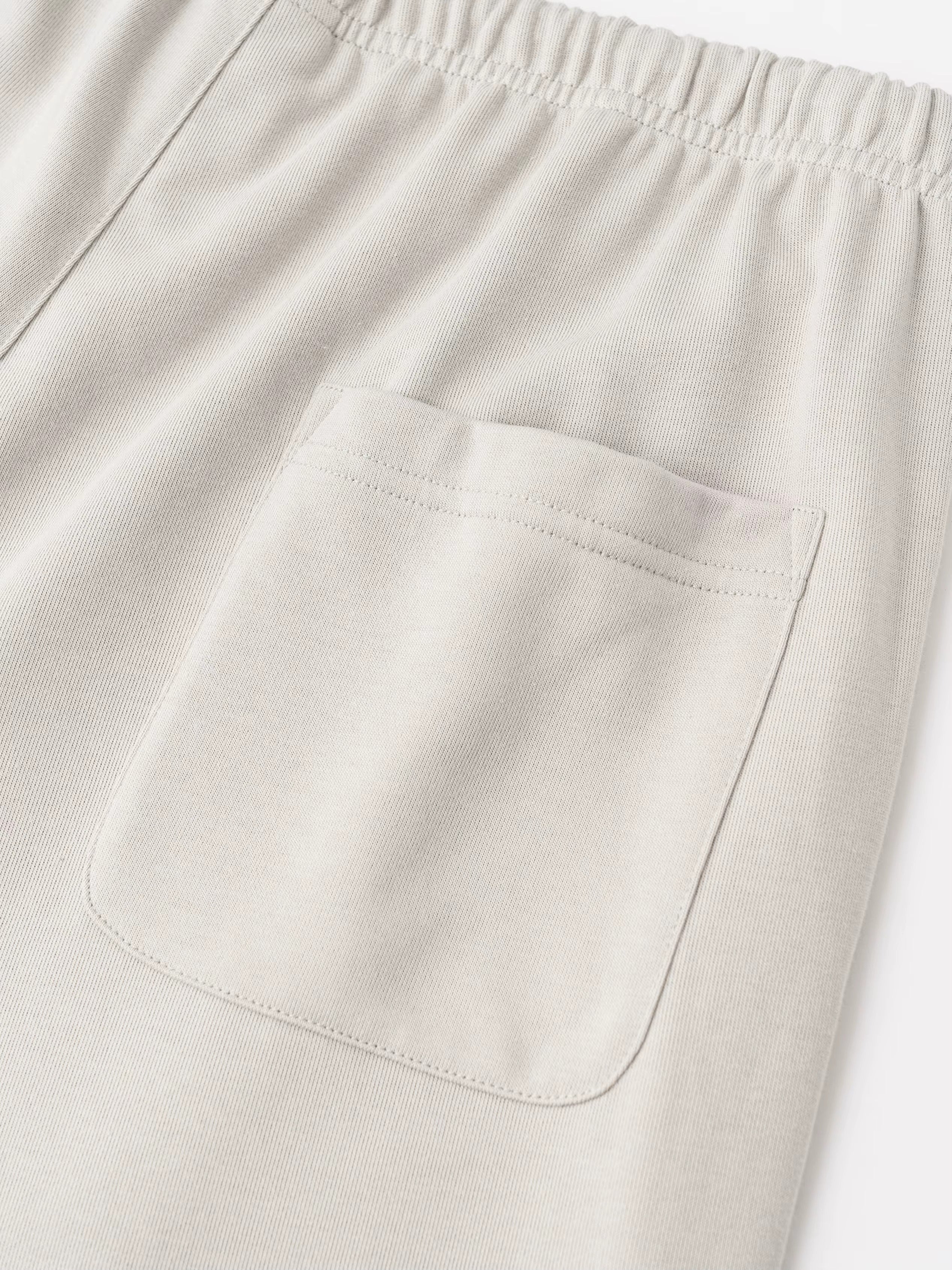 Curved Leg Baggy Sweatpants